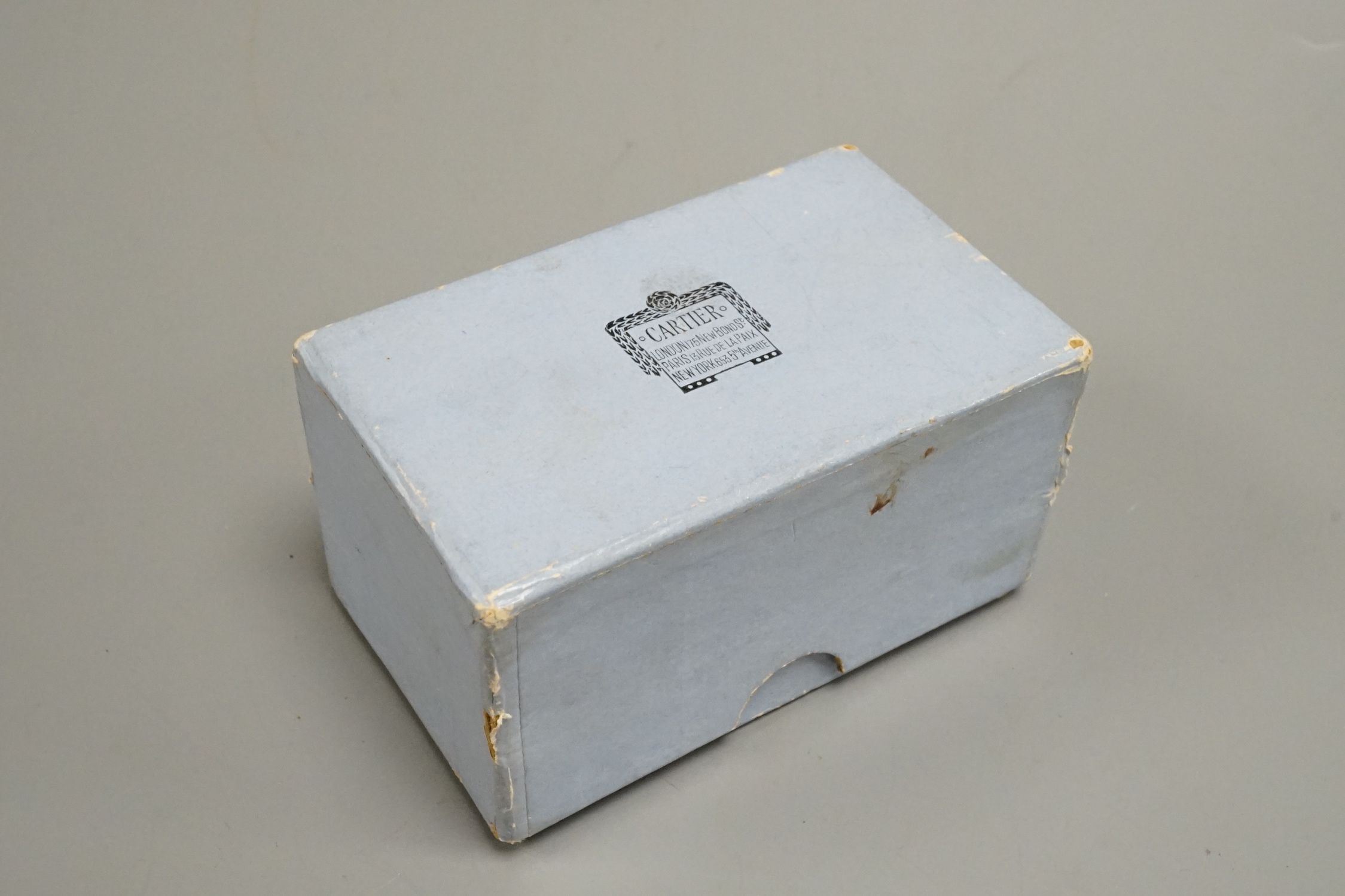 A Cartier box and cover, length 9.5cm.
